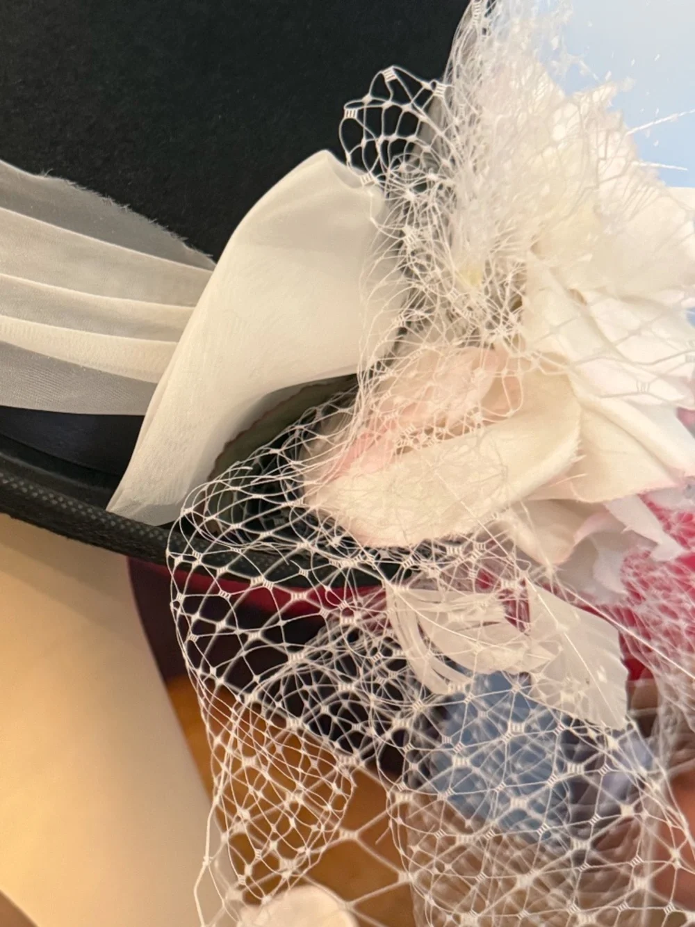 Black Felt Top Hat With White Toole Band, Silk Flowers, Feathers and Netting
